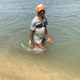 Surya Sailan waiting after casting his net.
